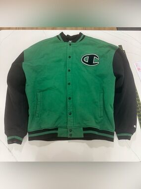 Champion varsity jacket in green and black with large embroidered chest patch